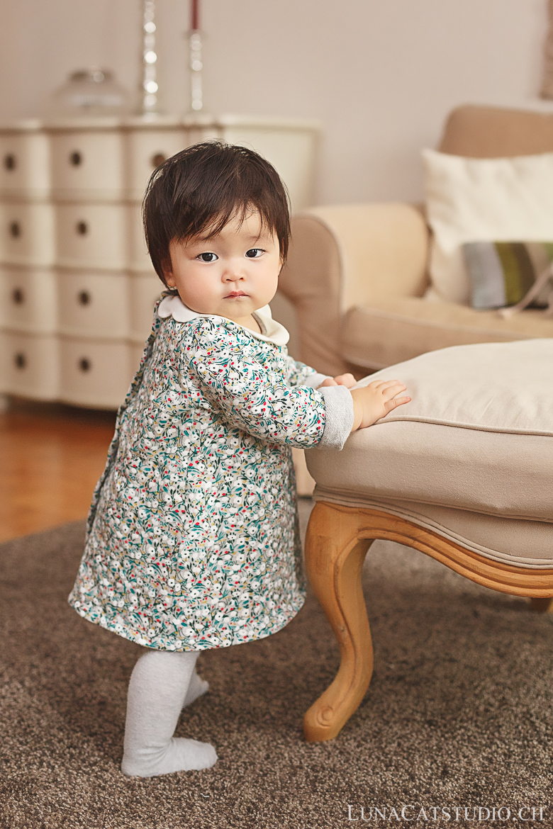 standing baby photographer standing baby photographer